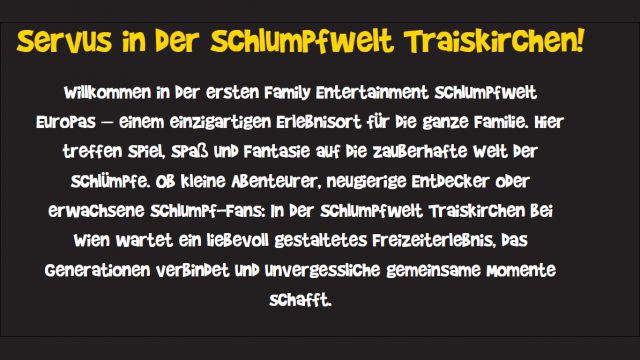 Begrüßungstext der Schlumpfwelt in gelber und weißer Comicschrift auf dunklem Grund: „Servus in der Schlumpfwelt Traiskirchen!“